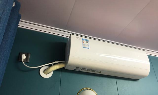 空调耗电与环境温度的关系（揭秘空调耗电的奥秘）